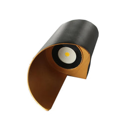 Modern wall light fixture with black and brown design on a white background