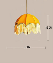 Yellow velvet dome pendant light with fringe, showing dimensions 36cm width and 33cm height.