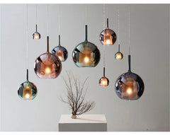 Rose Gold Glass Globe Pendant Light with Polished Metal Frame