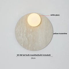 Wall light fixture with white glass cover and yellow travertine base on a gray background