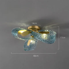 Ceiling light fixture with blue glass shades and gold metal components, shown against a dark background with measurements indicated.