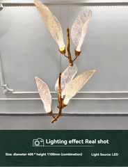 Decorative chandelier with leaf-like design on a gray background