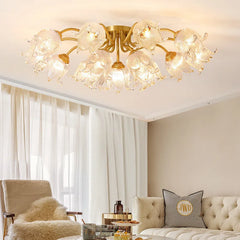Luxurious ceiling light fixture in a living room setting with a sofa and chair.