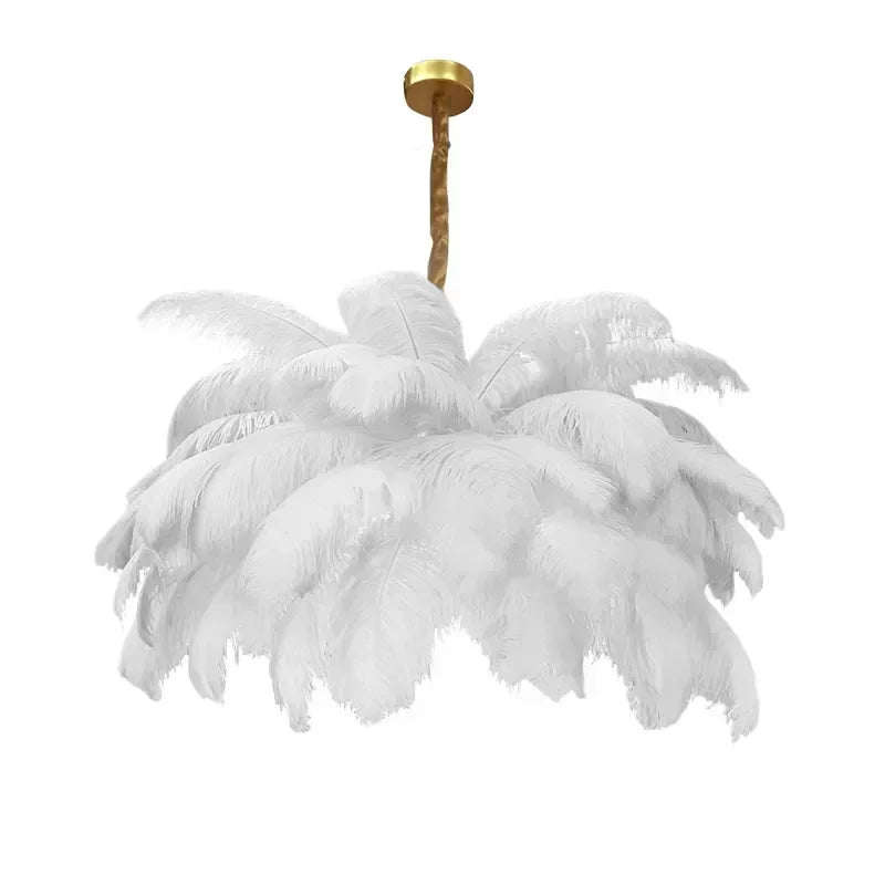 Feathered chandelier with white feathers and a gold fixture on a white background