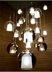 Rose Gold Glass Globe Pendant Light with Polished Metal Frame