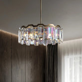Polished chrome chandelier with cascading faceted crystals