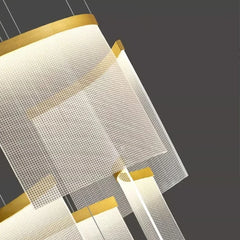 Close-up of a white fly screen with gold trim on a dark background