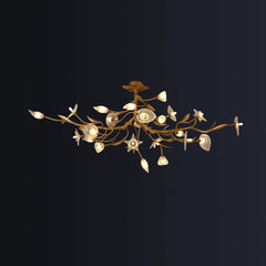 Decorative ceiling light fixture with floral design on a black background