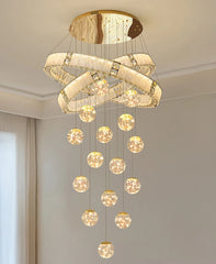 Modern chandelier with multiple hanging lights in a room setting