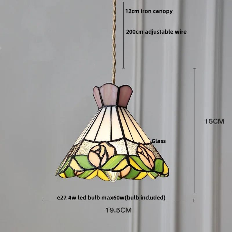 Stained glass pendant light with measurements on a gray background