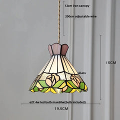 Stained glass pendant light with measurements on a gray background