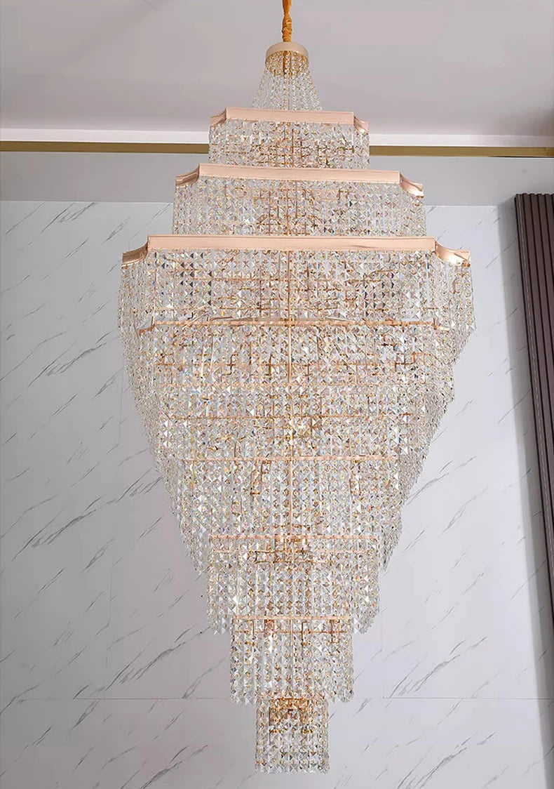 Crystal chandelier hanging against a marble wall