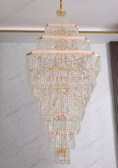 Crystal chandelier hanging against a marble wall