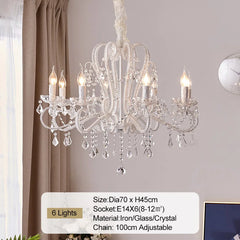 Crystal chandelier with six lights in a room setting.