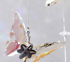 Crystal butterfly ornament with 'Export-grade crystal' text on a white background