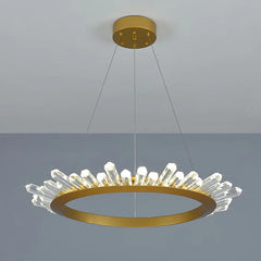 Gold chandelier with crystal-like elements on a gray background