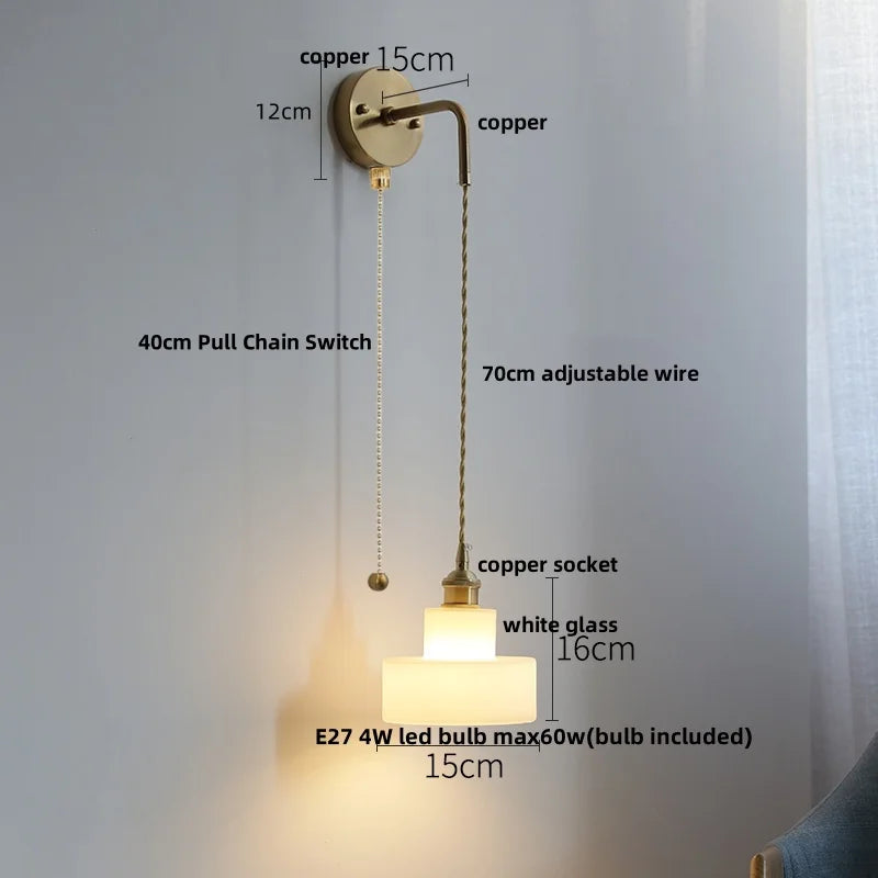 Wall-mounted light fixture with labeled dimensions and features on a neutral background