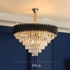 Chandelier with dimensions labeled against a blue wall