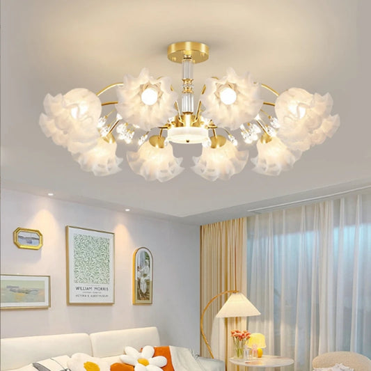 Gold semi-flush mount chandelier with floral-shaped diffusers and crystal accents.