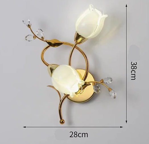 Decorative wall light fixture with floral design on a gray background