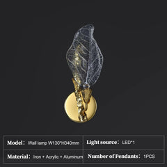 Decorative wall lamp with leaf design on a black background