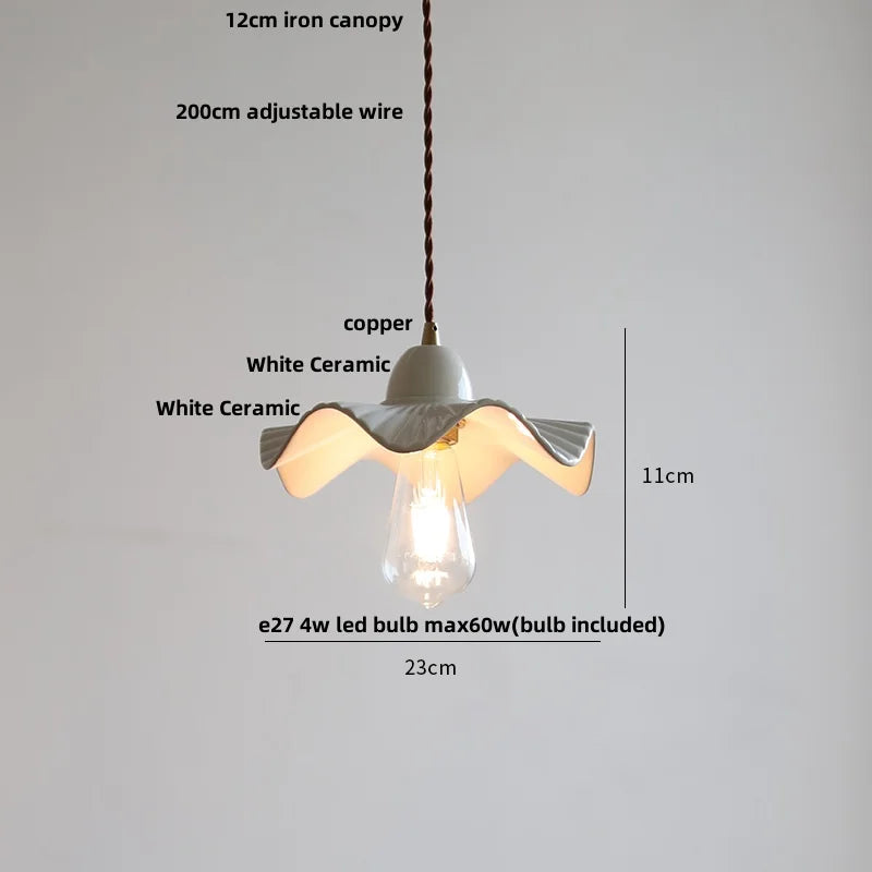 White ceramic pendant light with measurements on a gray background