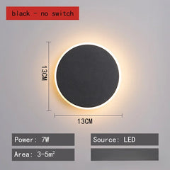 Modern Black Round LED Wall Sconce with Subtle Halo Light Effect