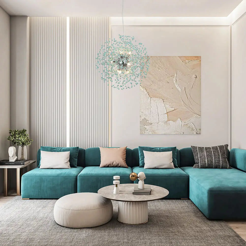 Modern living room with teal sectional sofa, round coffee table, and abstract art on the wall.