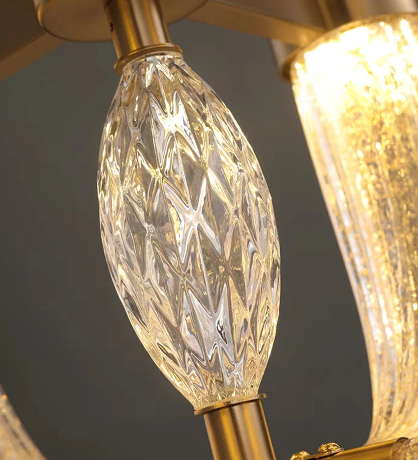 Close-up of decorative light bulbs with gold fixtures on a dark background