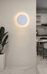 Modern Black Round LED Wall Sconce with Subtle Halo Light Effect