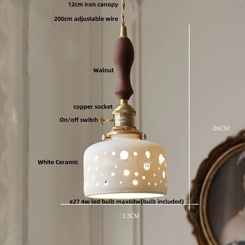 Pendant light with labeled components on a neutral background