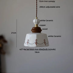 White ceramic pendant light with measurements and material details on a gray background