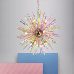 Close-up of a colorful starburst chandelier with many glass rods radiating outwards from a central gold fixture.
