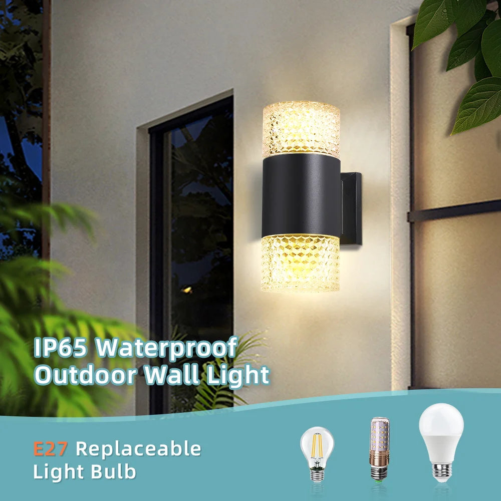 Outdoor wall light fixture with E27 light bulbs on a building exterior.