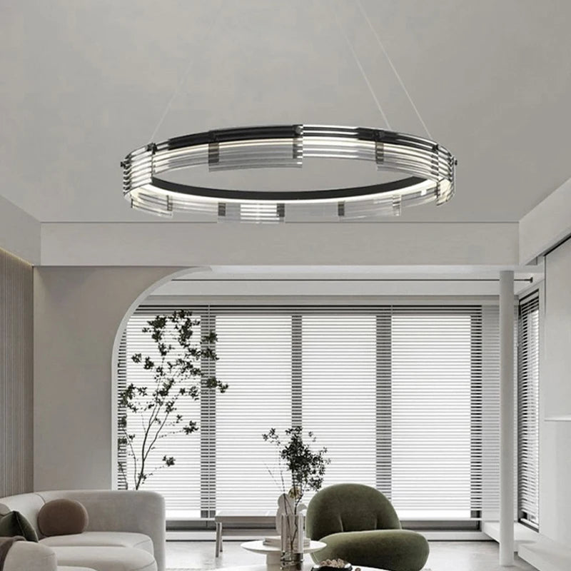 Modern chandelier in a living room with neutral decor