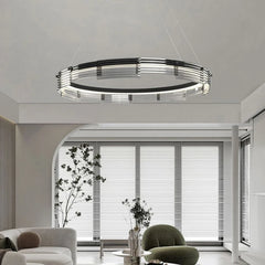 Modern chandelier in a living room with neutral decor