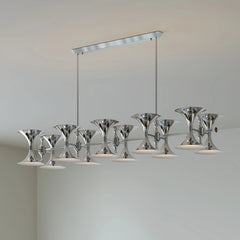 Close-up of the chrome chandelier's horn-shaped shades and polished finish