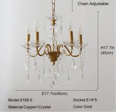 Gold chandelier with crystal accents and dimensions on a gray background