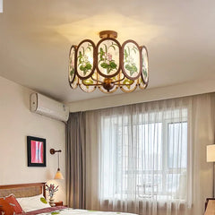 Bronze Chandelier with Frosted Glass and Green Leaf Floral Accents