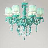 A cyan-colored crystal chandelier with fabric shades and teardrop crystal accents, shown against a white background.