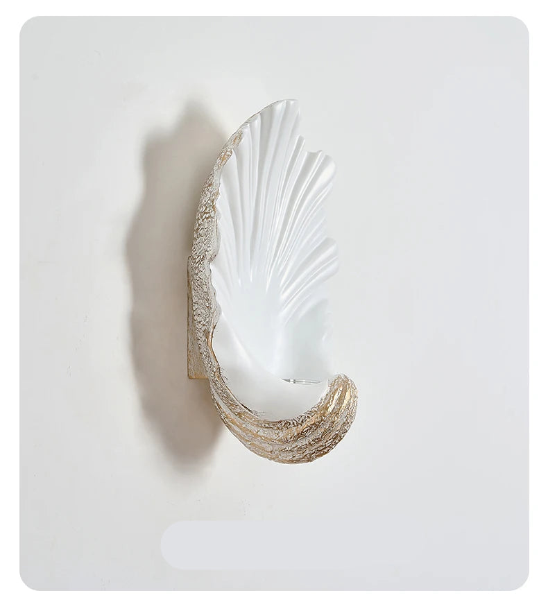 Decorative wall light fixture on a white background