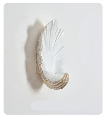 Decorative wall light fixture on a white background
