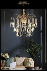 Luxury chandelier in a modern living room setting with a dark wall and decor.