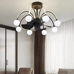 Modern chandelier with white spherical lights in a room with curtains and a chair.