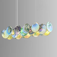 Colorful circular pendant light on a gray background