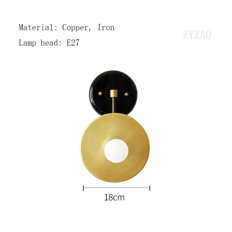 Wall-mounted lamp with black and gold design on a white background, featuring dimensions and material information.