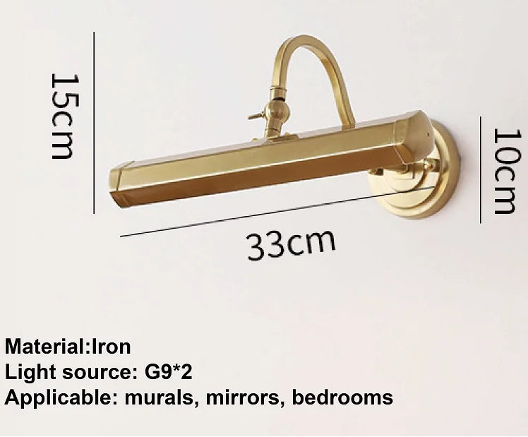 Gold wall-mounted light fixture with dimensions and material details on a white background