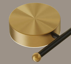 Gold drum beater on a gray background