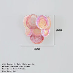 Decorative light fixture with pink and red glass elements on a gray background, with dimensions indicated.