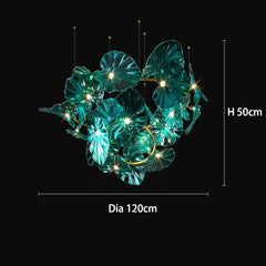 Decorative teal leaf light fixture with dimensions on a black background